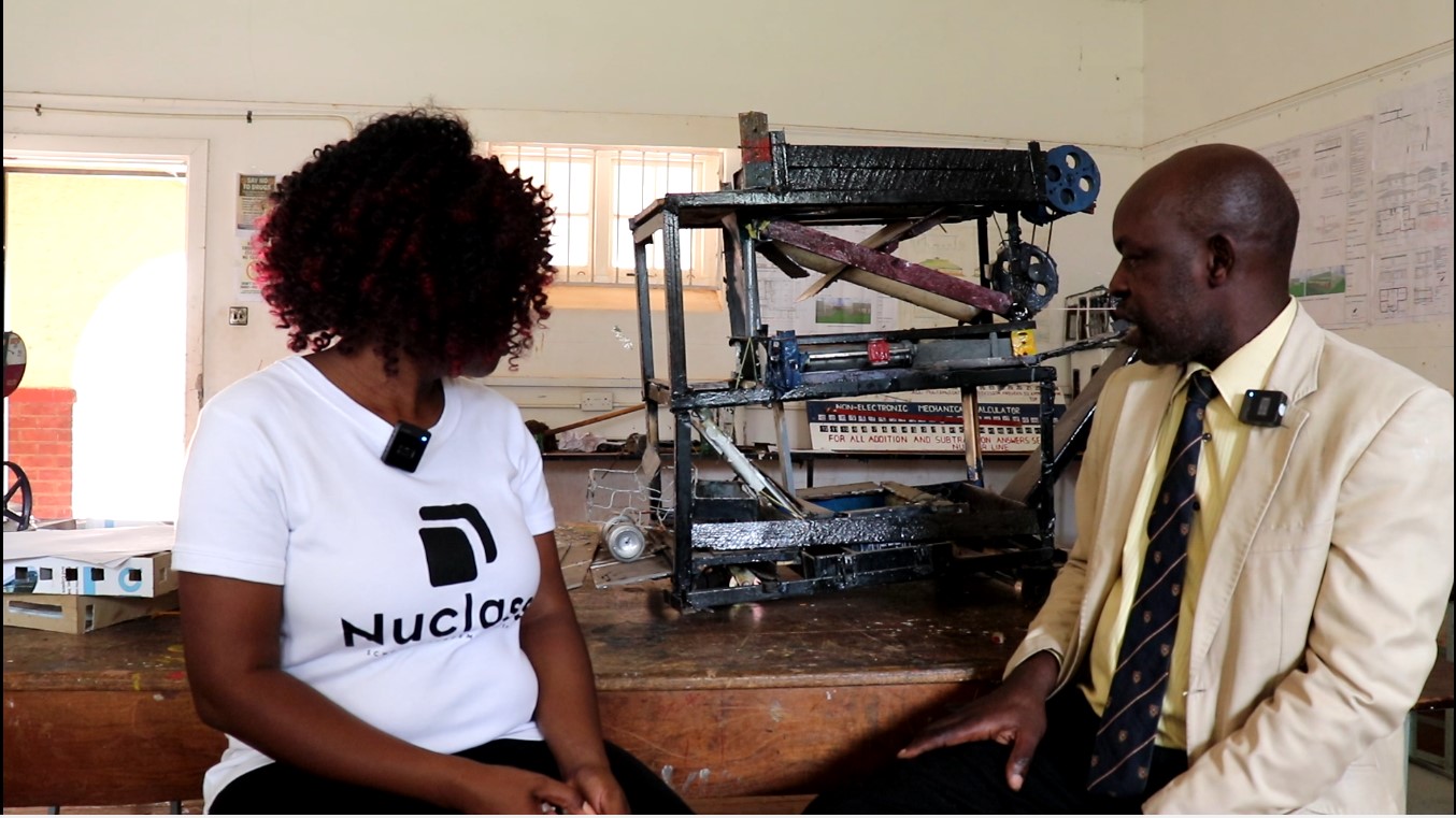 NuClass team engaging with Department of Technical Graphics and Innovation teacher at Plumtree High School to support student innovation projects in Zimbabwe.